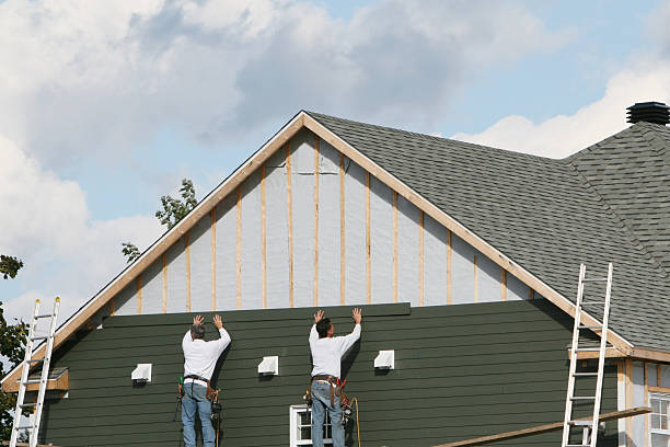 Professional Siding technician working in Woodbury, NY